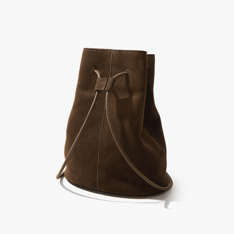 High Gloss Pebbled Cowhide Leather Mini Bucket Bag for Women Chic Vintage Inspired Design for Commute Versatile Shoulder and Handheld Style