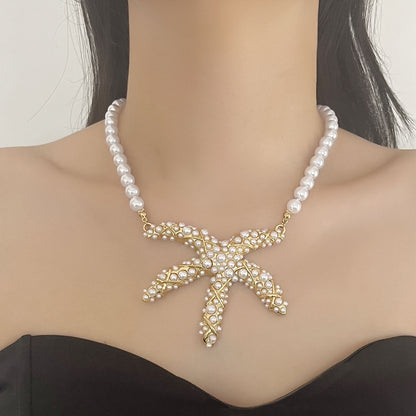 Unique Creative Alloy Starfish Pendant Necklace with Faux Pearl Beads - Perfect for Vacation Style and Summer Fashion