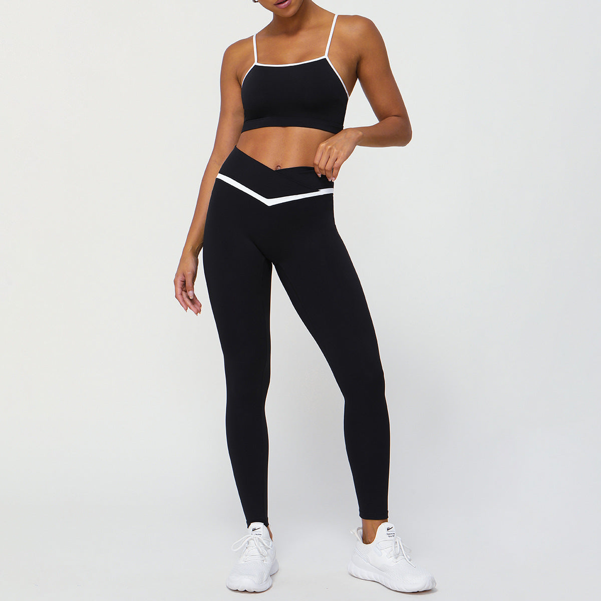 Color Contrast Yoga Set with Sleek Strappy Sports Bra and Cross V Waist Leggings for Fitness Enthusiasts and Active Lifestyles