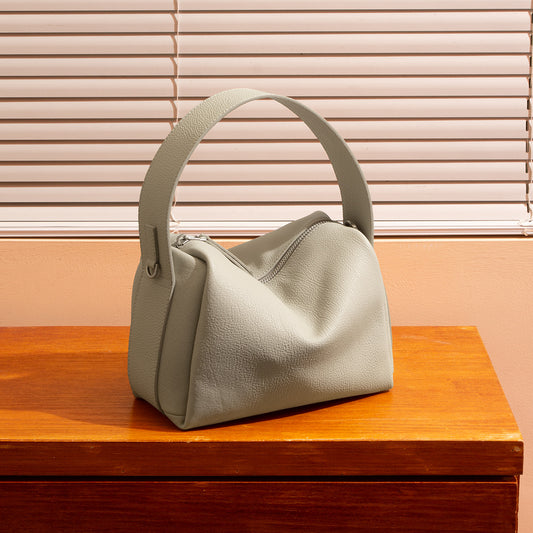 Versatile Genuine Leather Crossbody Bag for Everyday Commute Chic Minimalist Design Elegant Handheld Style Women's Accessory