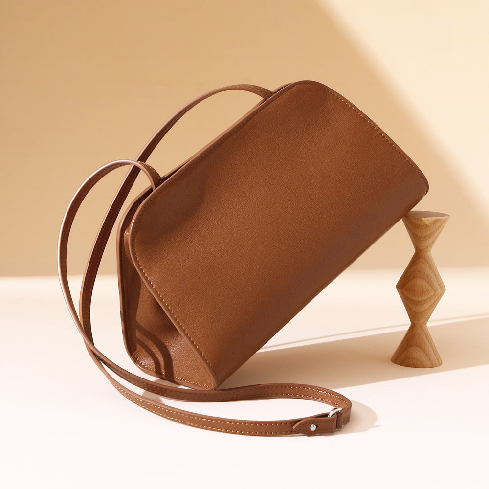 Luxurious French Style Leather Underarm Bag Vegetable Tanned Cowhide Clutch and Crossbody Purse for Women Chic Minimalist Design for Any Occasion