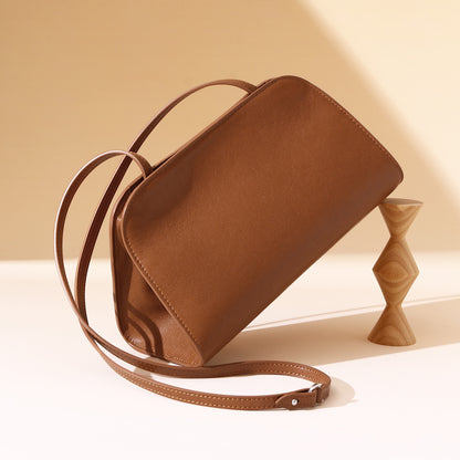 Luxurious French Style Leather Underarm Bag Vegetable Tanned Cowhide Clutch and Crossbody Purse for Women Chic Minimalist Design for Any Occasion
