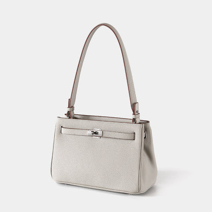 Luxurious Vintage Style Leather Tote Bag with Lock Closure Cowhide for Chic Commuting and Versatile Carrying Options