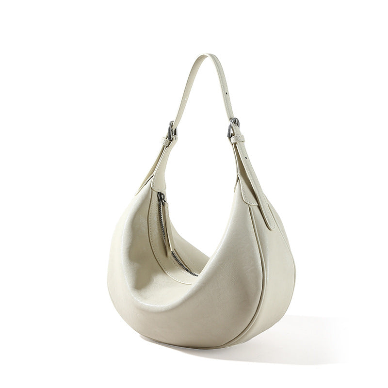 Genuine Leather Women's Bag Luxurious Vegetable Tanned Cowhide Fashion Dumpling Bag with Chic Minimalist Design for Shoulder and Crossbody Carry