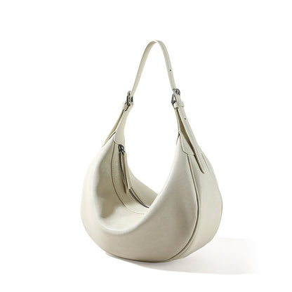 Genuine Leather Women's Bag Luxurious Vegetable Tanned Cowhide Fashion Dumpling Bag with Chic Minimalist Design for Shoulder and Crossbody Carry