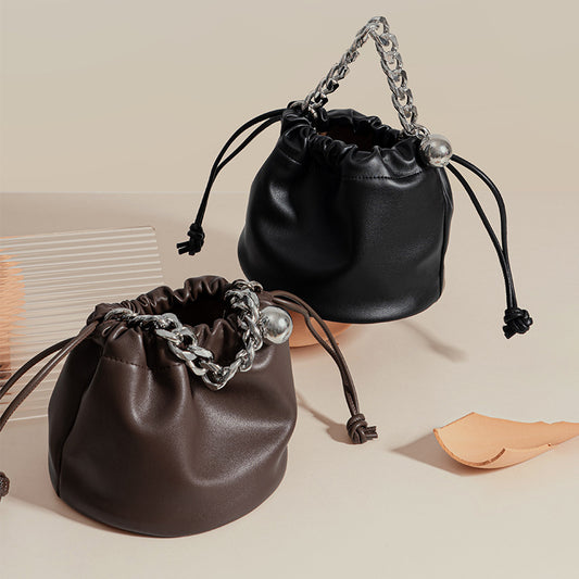 Korean Inspired Vintage Drawstring Bucket Bag for Women Genuine Leather Hoist Design Chain Shoulder Strap and Spacious Capacity for Everyday Use