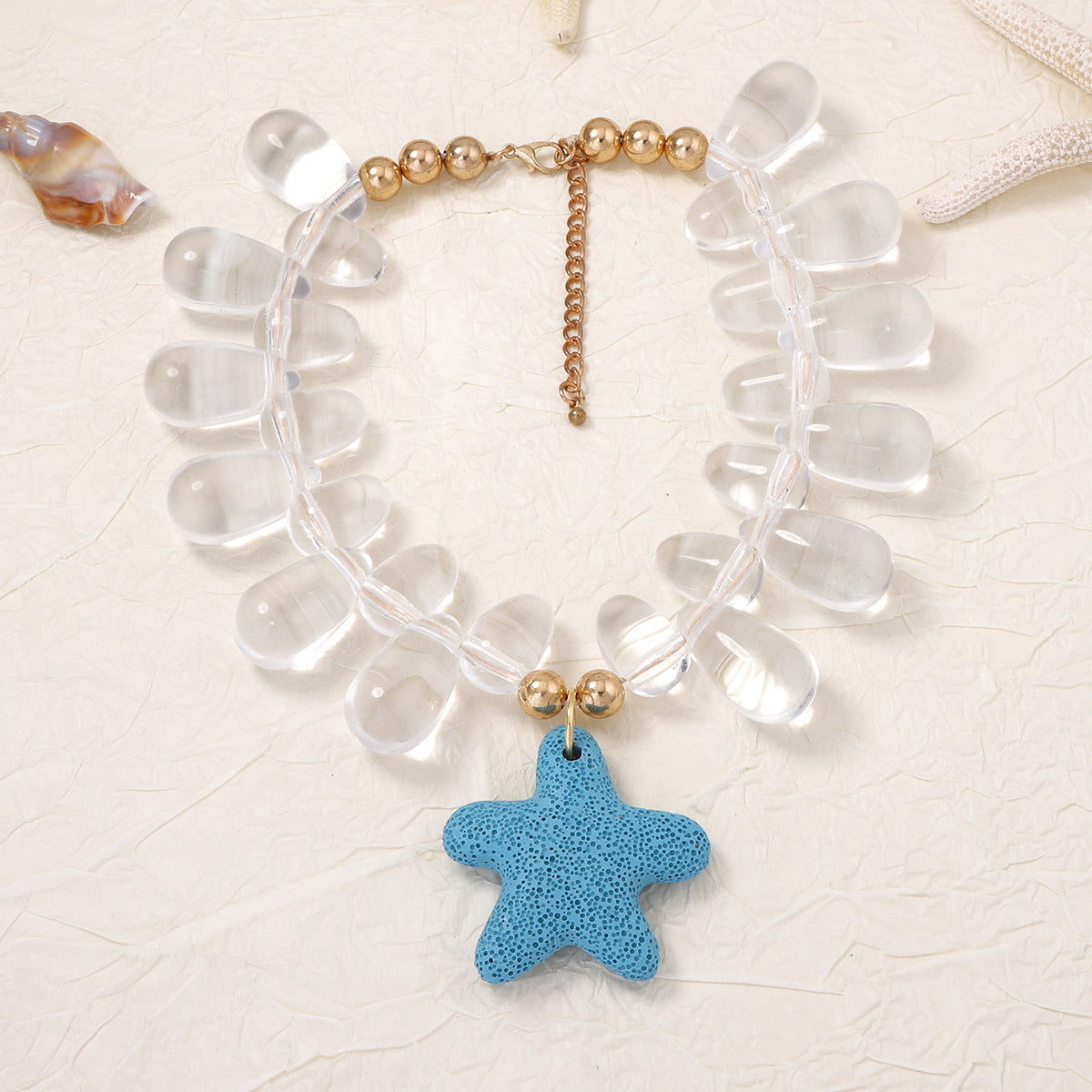 Exquisite Minimalist Natural Ocean-Inspired Vacation Necklace with Volcanic Stone, Starfish, and Tiny Fish Charms - Perfect Summer Accessory for Women