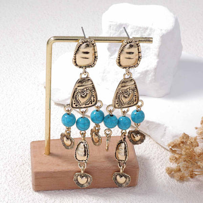 Chic Vintage Western-Inspired Irregular 3D Heart Tassel Earrings - Unique Distressed Design for Every Occasion