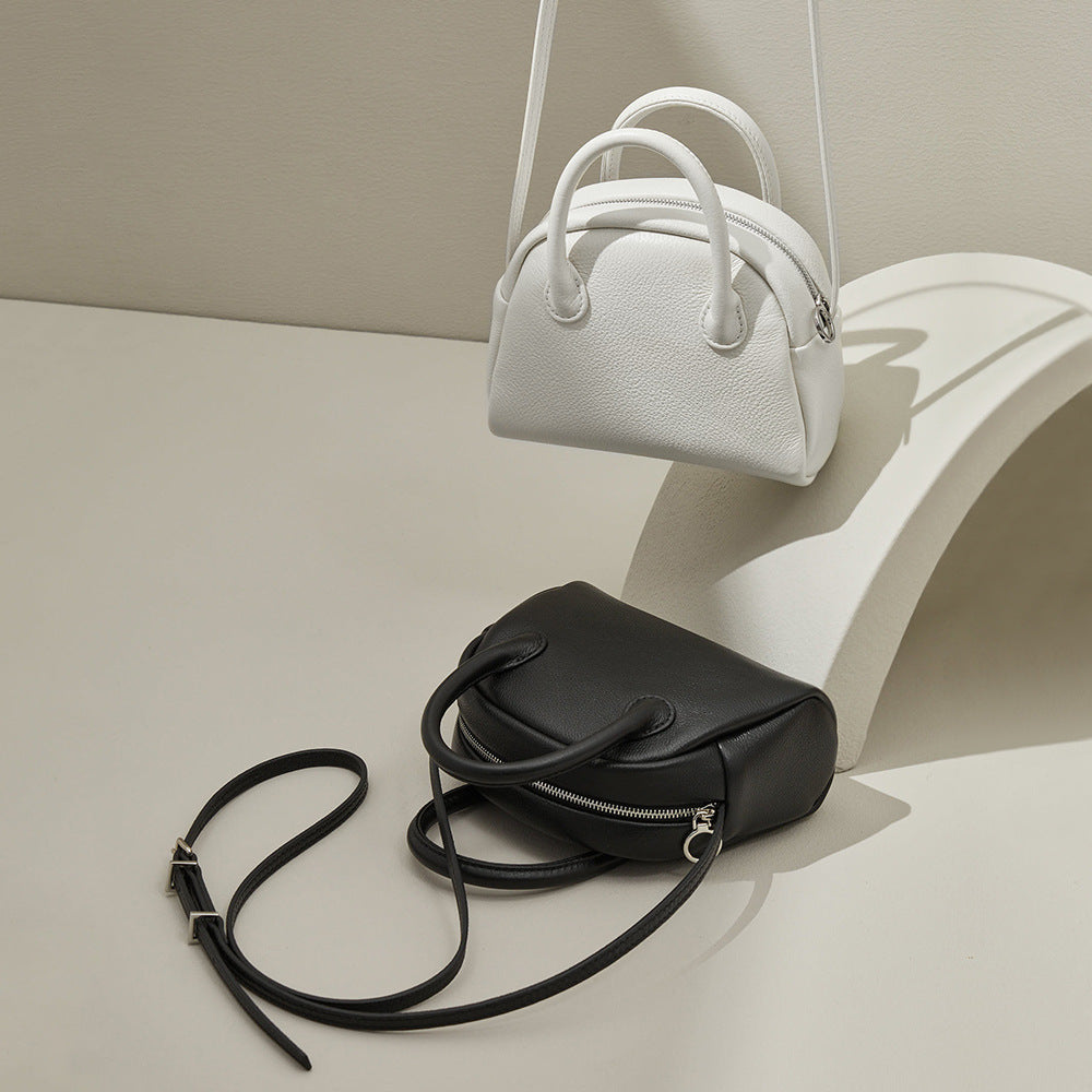 Grain Leather Korean Inspired Bowling Bag Shell Design Versatile Handheld Crossbody Carry Luxurious Genuine Leather Small Purse for Fashion Forward Individuals