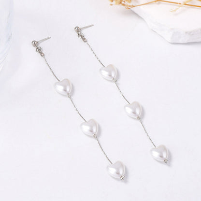 Elegant French-Style Long Pearl Heart Drop Earrings for Women - Chic and Unique Statement Piece Perfect for Parties and Special Occasions