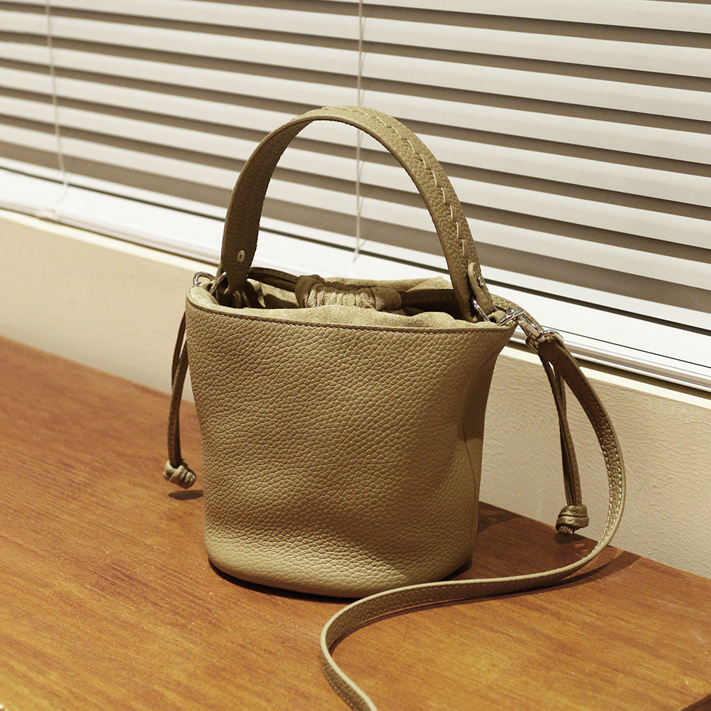First Layer Cowhide Bucket Bag and Minimalist Design Versatile Handheld Commuter Shoulder Crossbody Bag for Everyday Elegance