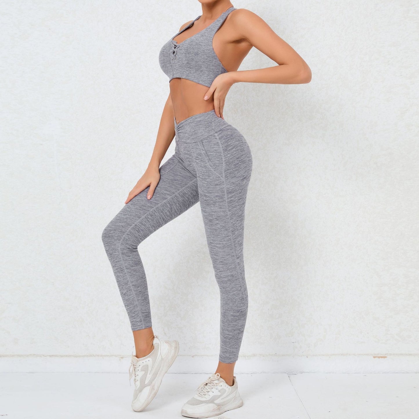 High Performance Sports Bra and Leggings Set for Comfort and Support Features Pocketed Yoga Pants Butt Lifting Design and Ruffled Waistband for Enhanced Workout Experience