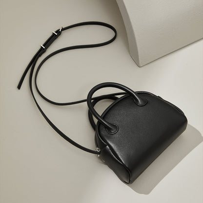 Grain Leather Korean Inspired Bowling Bag Shell Design Versatile Handheld Crossbody Carry Luxurious Genuine Leather Small Purse for Fashion Forward Individuals