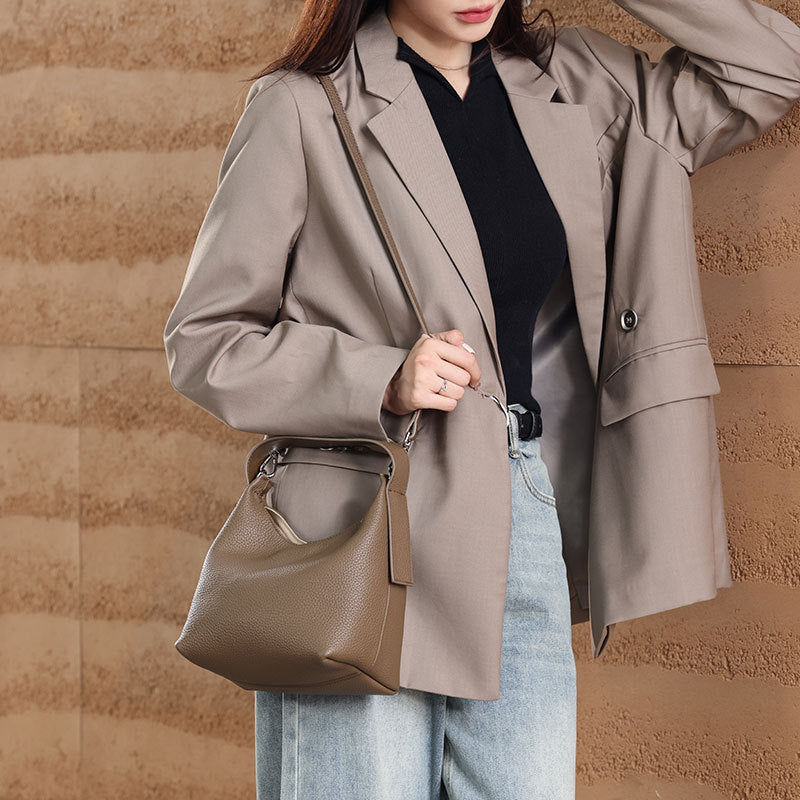 Versatile Bucket Bag Chic Korean Style Crossbody Handbag in Litchi Leather Featuring Magnetic Snap Closure Genuine Leather Tote for Everyday Commuting