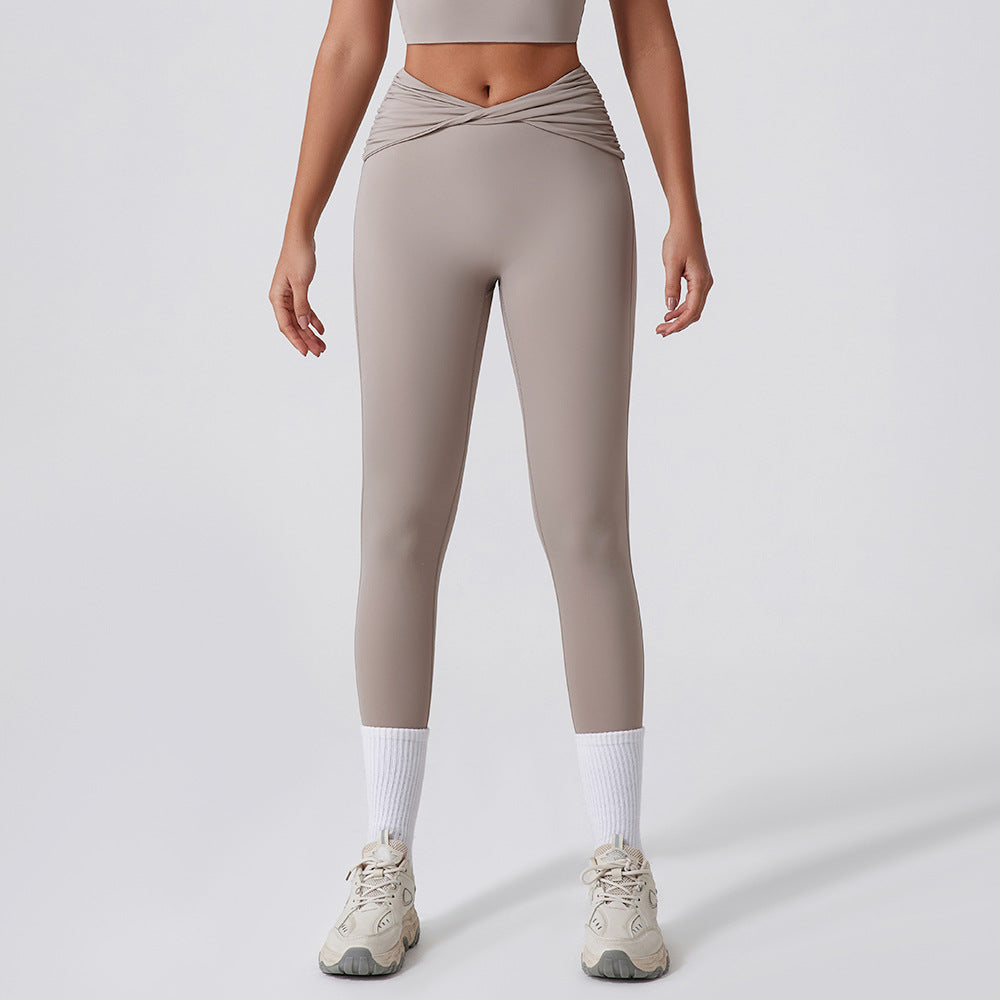 High Waisted Women's Quick Dry Yoga Pants with Twist Knot Butt Lifting Fitness Leggings for Running and Versatile Everyday Wear