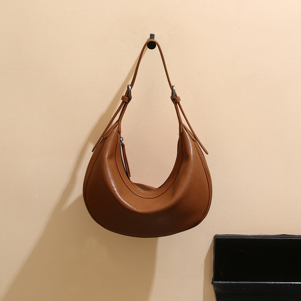 Genuine Leather Women's Bag Luxurious Vegetable Tanned Cowhide Fashion Dumpling Bag with Chic Minimalist Design for Shoulder and Crossbody Carry