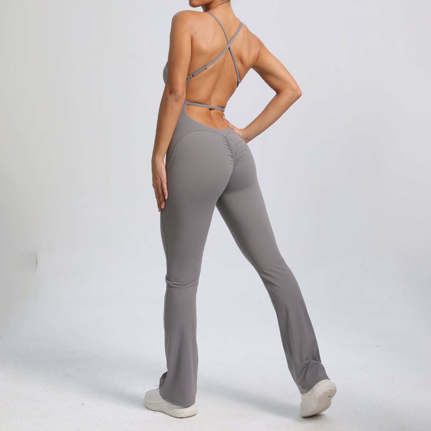 Adjustable Strap Micro Flare Bodysuit Sculpting Yoga Jumpsuit for Comfort and Style in Workout Sessions