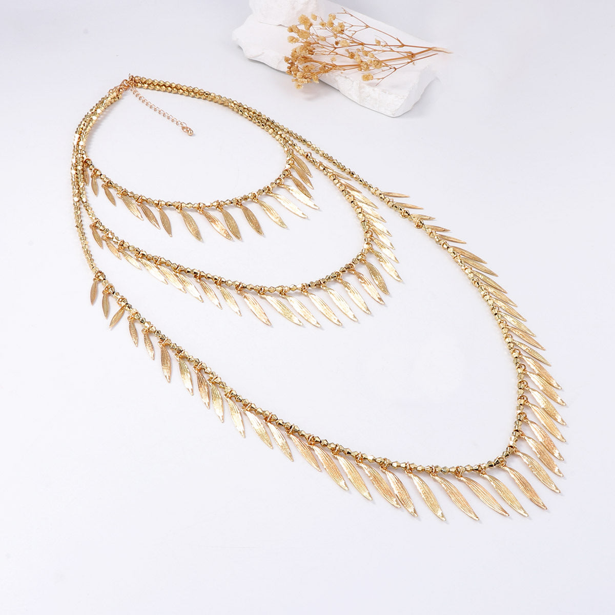 Boho-Chic Beaded Texture Pendant Necklace with Alloy Feather and Leaf Charms - Unique Personality Statement Jewelry for Effortless Style