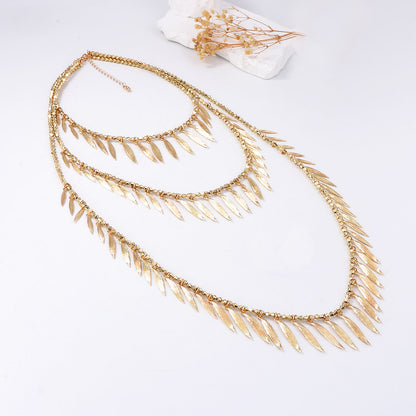 Boho-Chic Beaded Texture Pendant Necklace with Alloy Feather and Leaf Charms - Unique Personality Statement Jewelry for Effortless Style