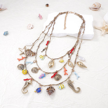 Chic Ocean-Inspired Layered Necklace with Alloy Seahorse, Shell, Starfish Charms & Faux Pearl - Perfect for Casual Vacations