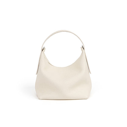 Versatile Bucket Bag Chic Korean Style Crossbody Handbag in Litchi Leather Featuring Magnetic Snap Closure Genuine Leather Tote for Everyday Commuting