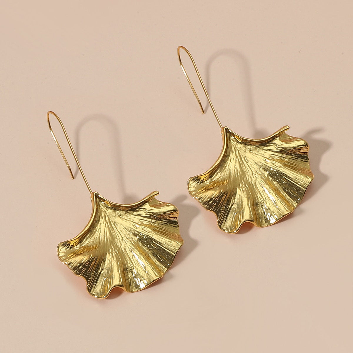 Exquisite Oversized Ginkgo Leaf Alloy Earrings - Minimalist Creative Design with Stylish Metallic Finish for a Unique Fashion Statement