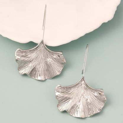 Exquisite Oversized Ginkgo Leaf Alloy Earrings - Minimalist Creative Design with Stylish Metallic Finish for a Unique Fashion Statement