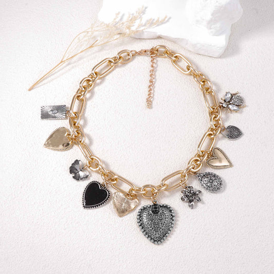 Vintage-Inspired Creative Alloy Heart Pendant Necklace with Micro-Paved Zircon Stones - Stylish Chain Options for a Unique Look