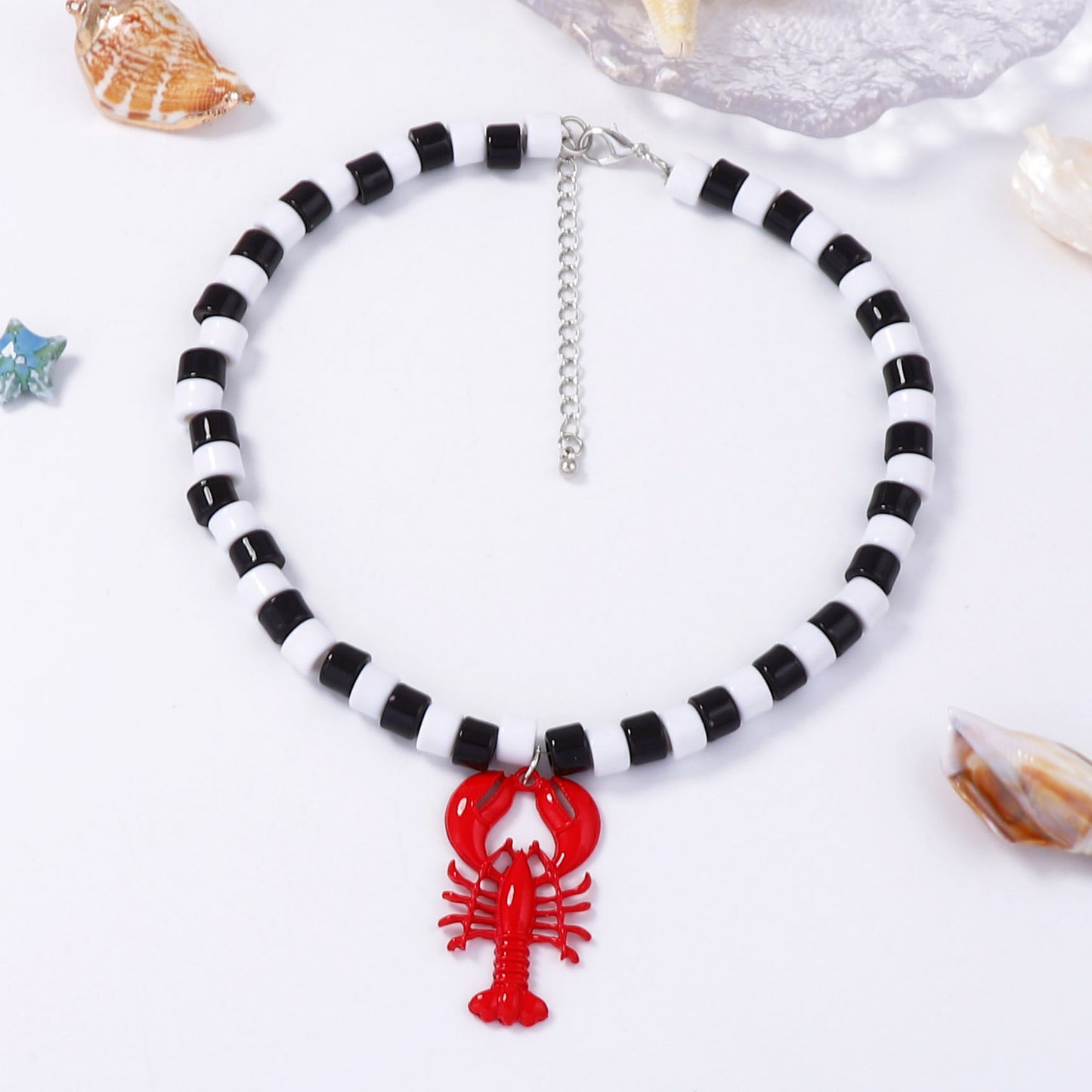 Chic Minimalist Beach-Inspired Alloy Lobster Pendant Necklace for Women - Elegant Black and White Beaded Statement Jewelry