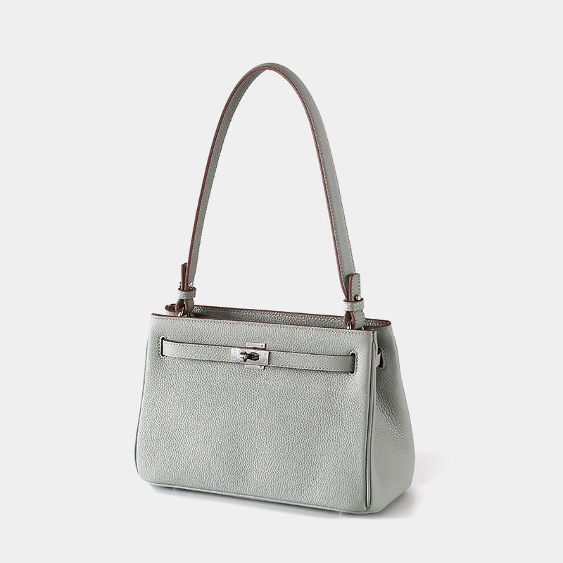 Luxurious Vintage Style Leather Tote Bag with Lock Closure Cowhide for Chic Commuting and Versatile Carrying Options