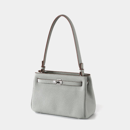 Luxurious Vintage Style Leather Tote Bag with Lock Closure Cowhide for Chic Commuting and Versatile Carrying Options