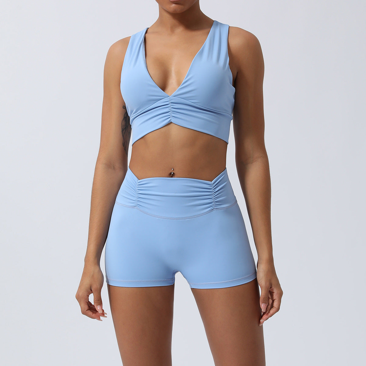 Spring Summer Yoga Set Beautiful Back Sports Bra with Ruching and High Waisted Mid Length Shorts for Comfort and Performance