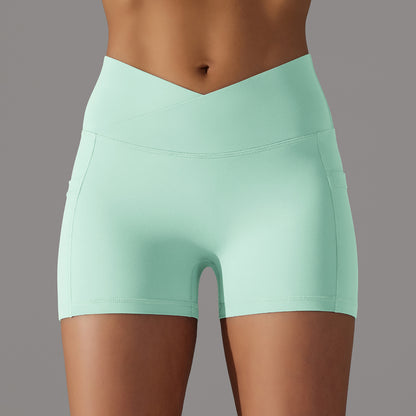 Trending High Waisted Cross Cut Yoga Shorts with Pockets Soft Skin Friendly Fabric for Comfort and Breathability for Enhancing Your Curves