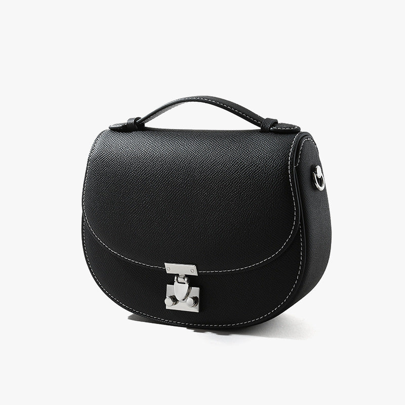 Spring Collection Genuine Leather Women's Handbag Minimalist Cowhide Tote with Unique Design Versatile Crossbody Bag for Commuting and Everyday Use