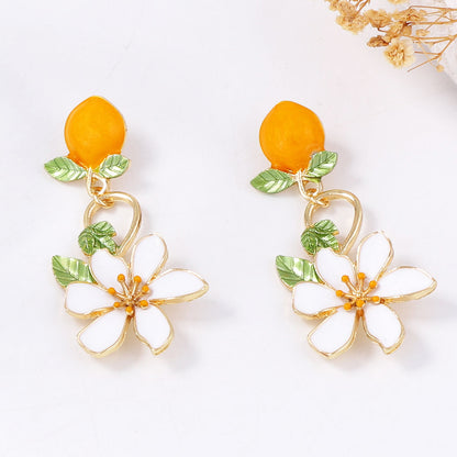 Chic Korean-Inspired Alloy Drop Oil Peach Blossom Earrings - Fresh & Minimalist Design for Stylish Vacation Wear