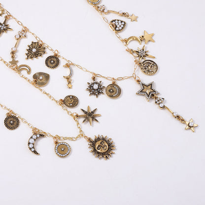 Unique Retro Luxe Gold-Tone Alloy Layered Chain Necklace with Sun, Moon, and Stars Charm for Women – Perfect for Layering, Versatile Fashion Accessory