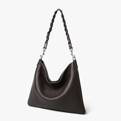 Grain Leather Minimalist Tote Bag Spacious Luxury Handbag for Women with Unique Woven Shoulder Strap for Commuting and Everyday Use