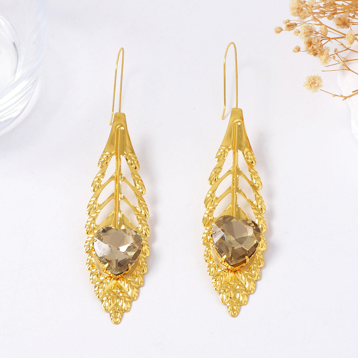 Luxurious Vintage-Inspired Statement Earrings with Intricate Metal Filigree and Exaggerated Feather Leaf Design – Perfect for Glamorous Parties and Special Occasions