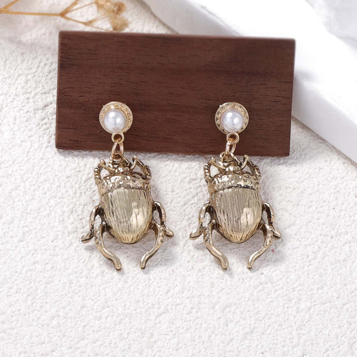 Unique Vintage-Inspired Alloy Beetle Earrings with Faux Pearl Accents – Distinctive and Eye-Catching Accessories for Your Individual Style