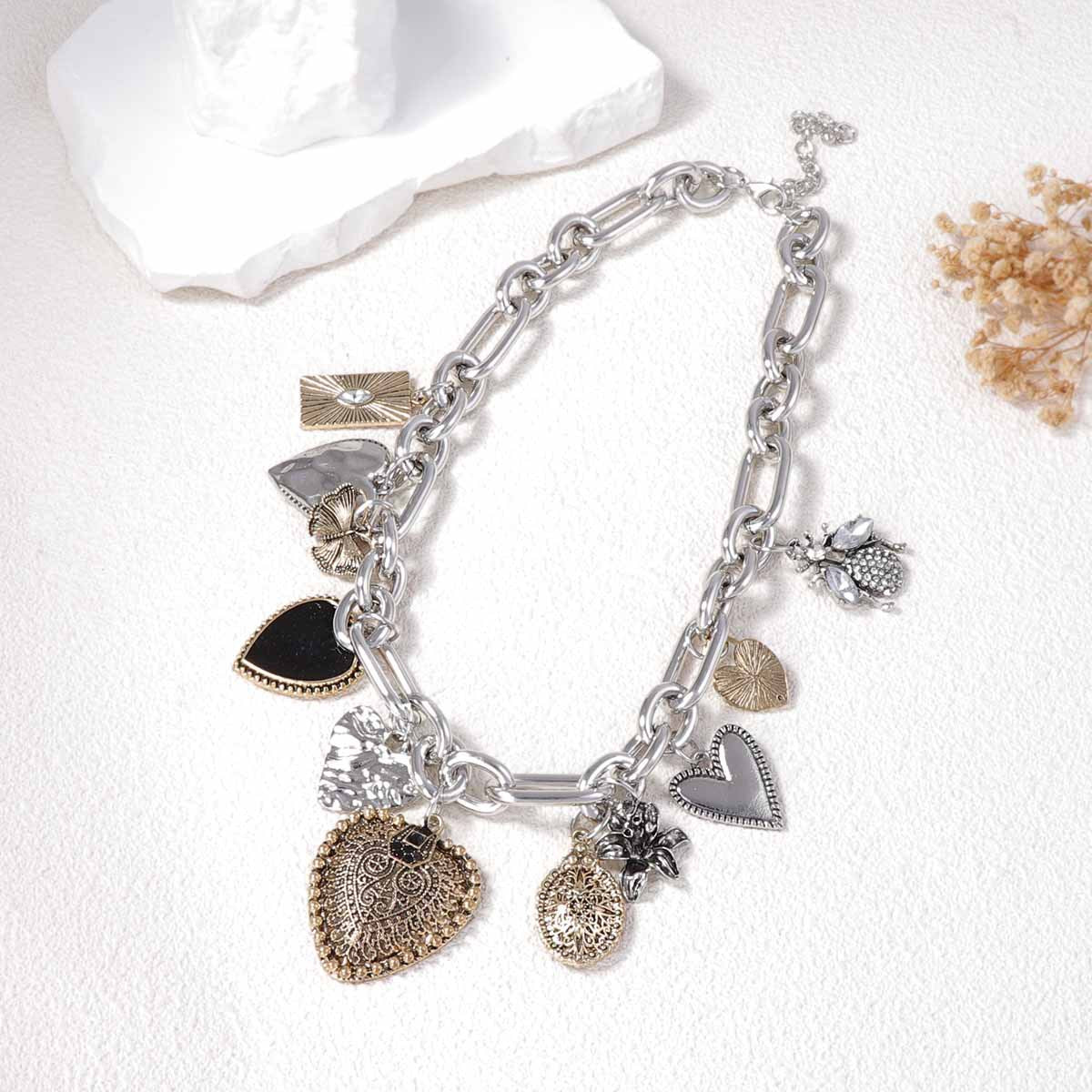 Vintage-Inspired Creative Alloy Heart Pendant Necklace with Micro-Paved Zircon Stones - Stylish Chain Options for a Unique Look