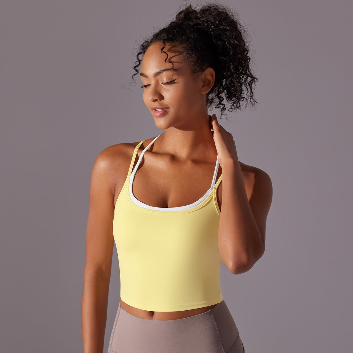 Strappy Sports Bra with Padded Cups Versatile Yoga Tank Top for Women Shock Absorbing Design for Fitness and Daily Wear