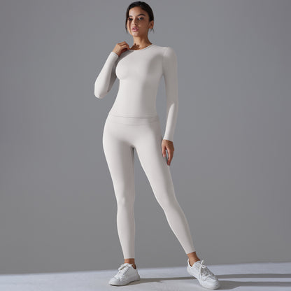 High Waisted Long Sleeve Yoga Set with Fitted Round Neck and Sculpting Leggings for Comfort and Style