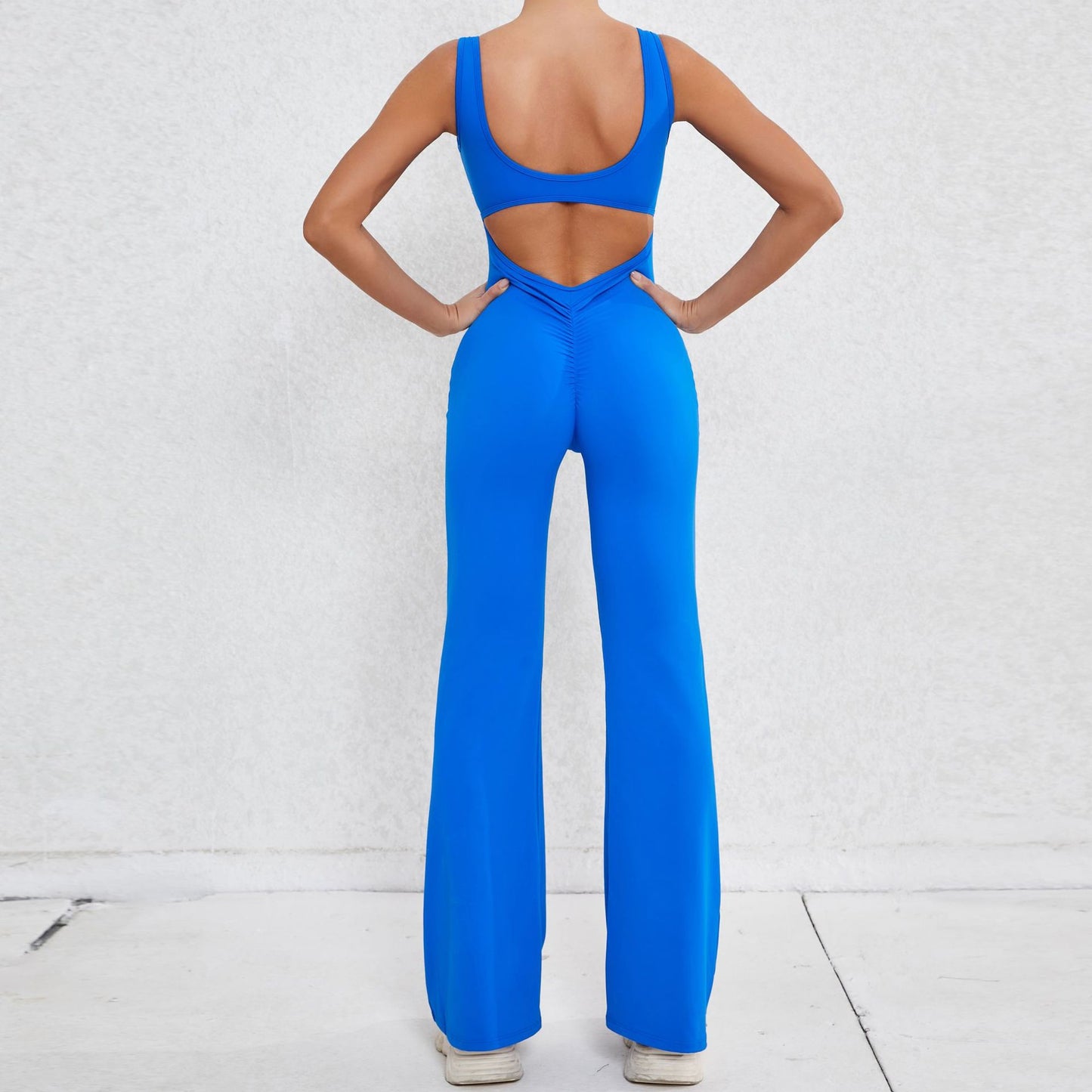 Elevate Your Workout with Our Hollow Back Peach Lift Jumpsuit Flare Leg Yoga Bodysuit for Comfort and Performance