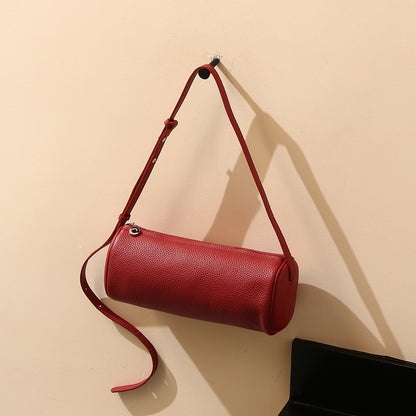 Chic Minimalist Leather Pencil Case Purse for Women Commute Friendly Cylindrical Bag with Spacious Capacity and Crossbody Design