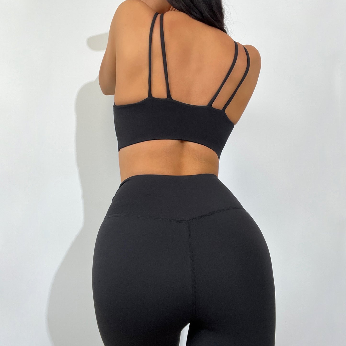 Women's Yoga Set Double Strap Sports Bra with Crossed Waist and Side Ruched Leggings for Comfort and Style