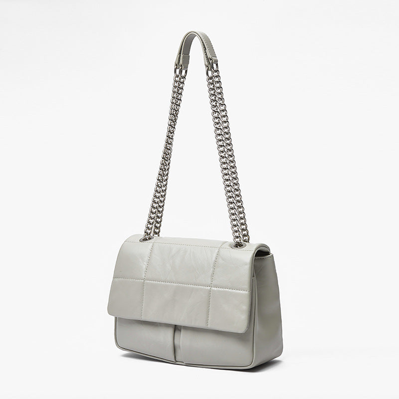 Korean Inspired Chain Handle Crossbody Bag Grain Leather Spacious Design and Unique Style for Everyday Use