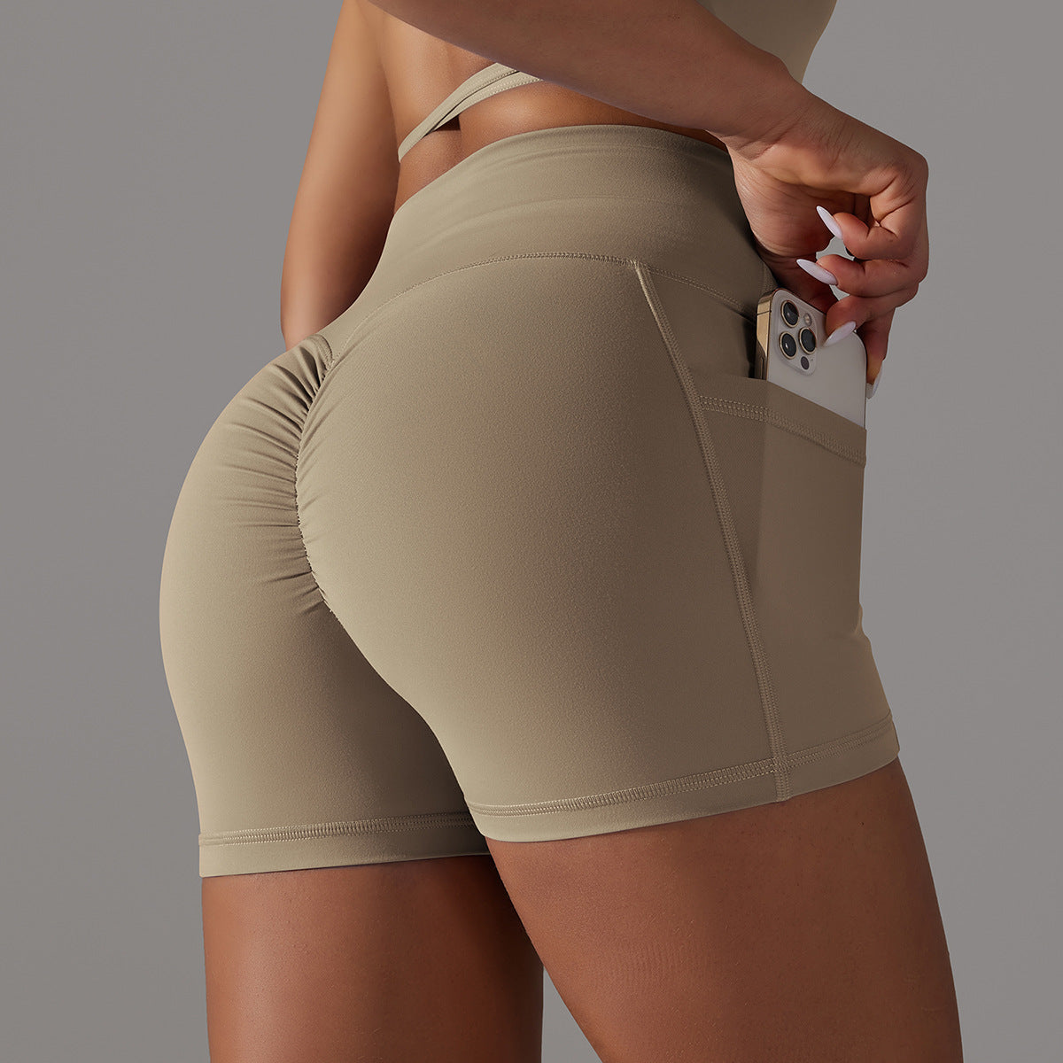 Trending High Waisted Cross Cut Yoga Shorts with Pockets Soft Skin Friendly Fabric for Comfort and Breathability for Enhancing Your Curves