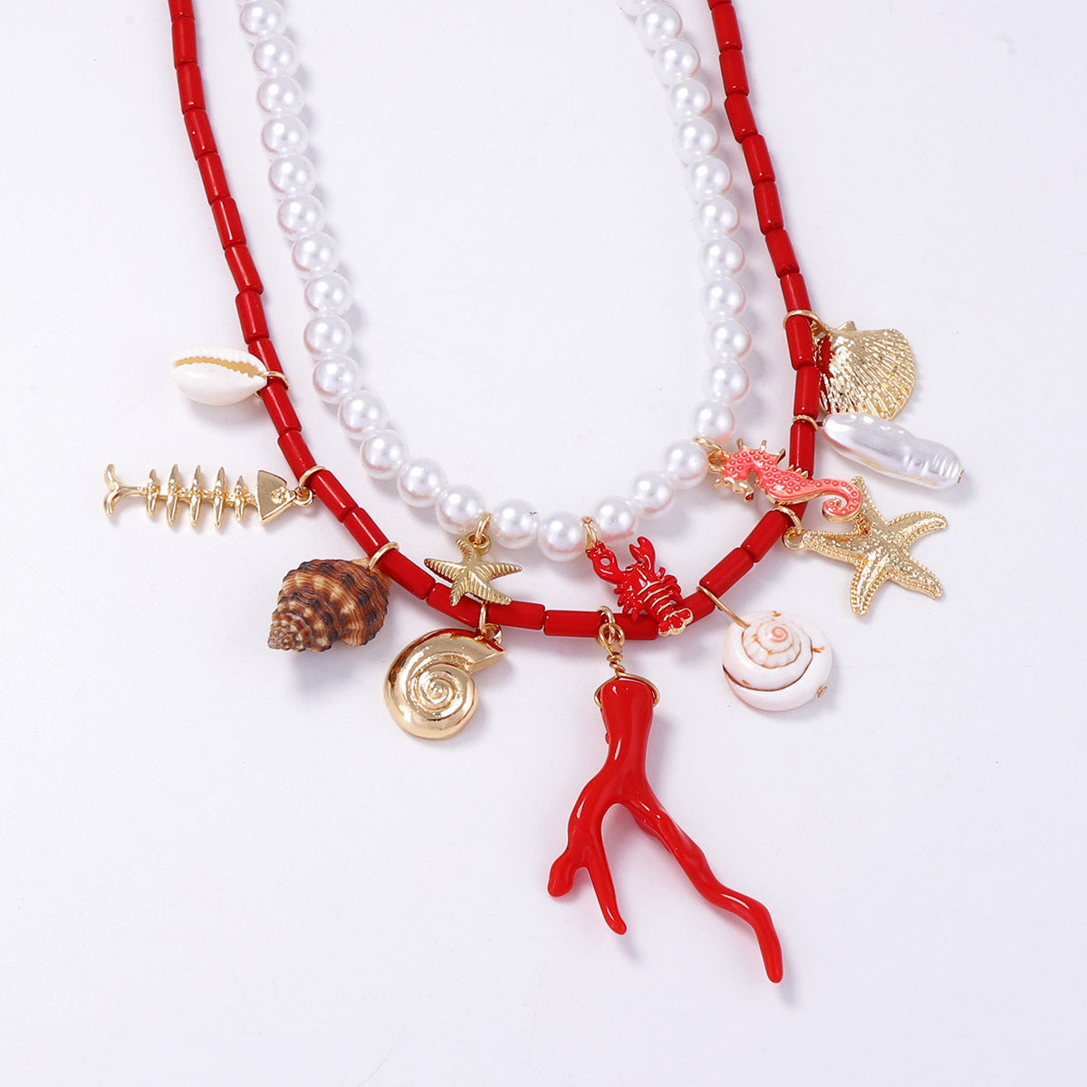 Trendy Minimalist Ocean-Inspired Double-Layer Pendant Necklace with Faux Pearl, Starfish, Seashell, and Coral Accents - Perfect for Casual Vacations and Beach Getaways