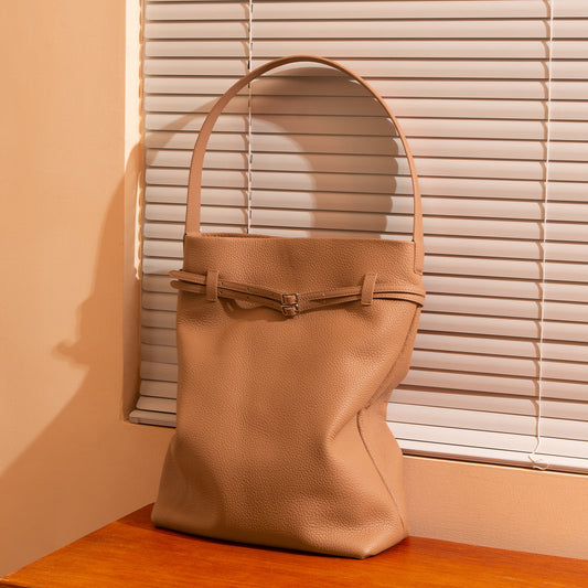 Luxury Spring Leather Handbag for Women First Layer Cowhide Tote with Unique Design Versatile Shoulder Bag and Chic Underarm Style