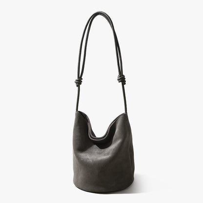 Elegant High Quality Cowhide Drawstring Bucket Bag Vintage Leather Tote for Women Spacious Design for Commuting and Daily Use